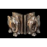 Pair of Carved Wood Bookends in the form of Elephants. Measure 6.5" tall by 6" wide approx.