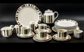 Midwinter Tea Service comprising a Tea Pot, four cups and saucers, five side plates,