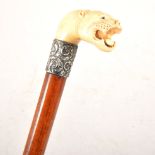 A Victorian ivory head and silver-banded walking cane