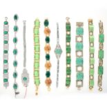 Ten vintage costume jewellery bracelets set with green paste and simulated jade,