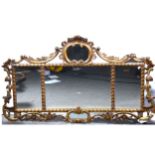 A gilt gesso overmantel triptych mirror