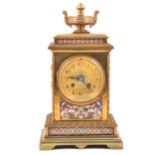 A 19th Century French brass and champleve enamel mantel clock.