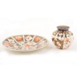 A Royal Crown Derby pot pourri vase and cover, and an Imari pattern plate.