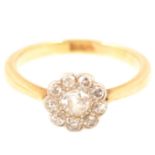 A diamond cluster ring, floral design,