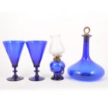 Set of six 'Bristol' blue glass goblets; and other blue glass
