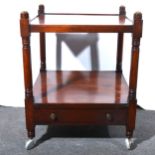 A mahogany two-tier side table, adapted to a trolley.