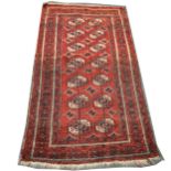 A Tekke rug, and another rug.