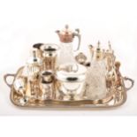 A collection of silver-plated wares, to include trays, claret jugs, vases, goblets etc.