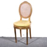 A gilt wood salon chair, and a gilt gesso wall bracket.