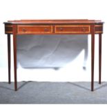 A reproduction mahogany console table, in the Sheraton style,