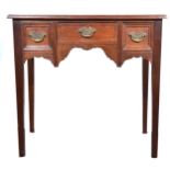 A Georgian style mahogany side table with leather top.