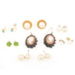 A collection of cultured pearl stud earrings, cameo earrings in jet frames.