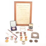 A collection of George V County Council service medals, cufflinks, stamp case, silver front to