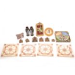 A small collection of Egyptian items, plus Victorian tiles, a framed material buttonhole and a