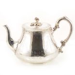 A Victorian silver teapot by Thomas Smily, London 1861.