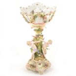 A large Continental porcelain figural table centre