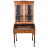 Victorian mahogany tambour front bureau with associated bookcase top