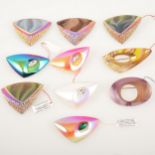 Ten 1950's retro futuristic glass brooches, various colours.