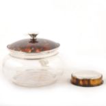 A large glass dressing table jar with silver and tortoiseshell lid by W G Sothers Ltd, Birmingham