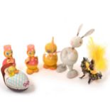 Collection of vintage Easter decorations, including card eggs, animals/bird figure containers,