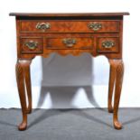 A reproduction burr elm lowboy, in the Georgian style,