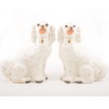 Pair of large Staffordshire King Charles Spaniels.