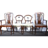 A pair of inlaid stained beechwood salon chairs, and a pair of Victorian balloon back chairs.