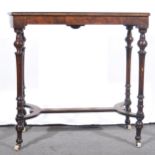 A Victorian figured walnut and amboyna stretcher table.