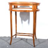 An Edwardian style beechwood and banded display table.