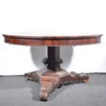 A Victorian mahogany tilt-top dining table.