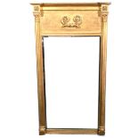 A Regency style gilt gesso pier glass.