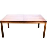 A vintage teak extending dining table.