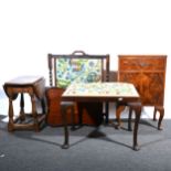 A figured walnut bedside cupboard; walnut stool; firescreen; small drop-leaf table; and a mahogany