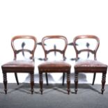 Three Victorian hoop-back dining chairs, and another dining chair.