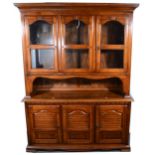 A reproduction Colonial style dresser / sideboard, and set of six Colonial style dining chairs.