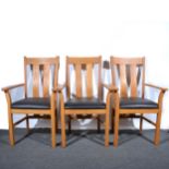 A contemporary handmade oak dining pedestal table and eight elbow chairs, by BerryDesign.