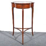 An Edwardian inlaid mahogany display table.