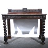 A carved and stained oak hall table.