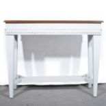 A modern painted console table.