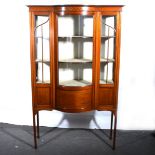 An Edwardian inlaid mahogany display cabinet.