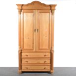 A Continental pine armoire/ twin-door wardrobe.