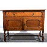 A small oak sideboard.