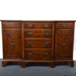 A reproduction walnut finish breakfront sideboard, of small size.