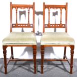 A pair of late Victorian walnut single chairs