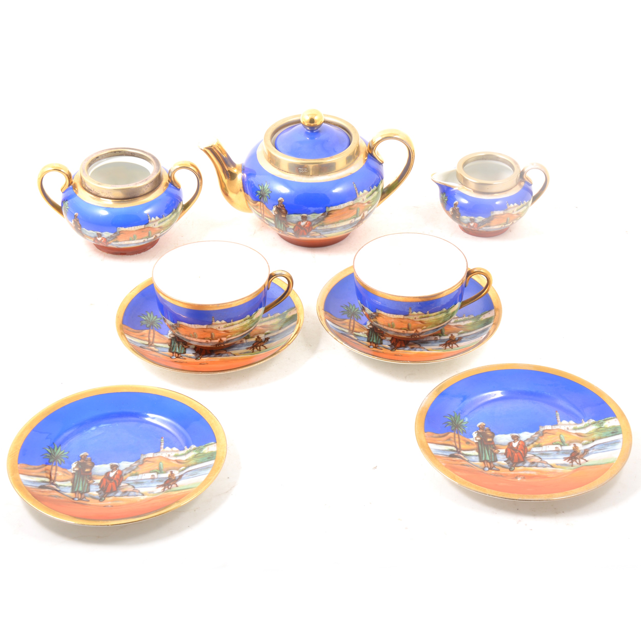 Continental porcelain tea service with an Arabian desert scene