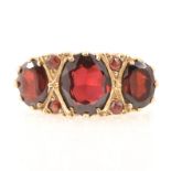 Reproduction Victorian style 9 carat gold garnet dress ring