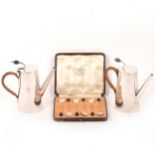 Pair of silver-plated coffee pots by Hulkin & Heath, six silver coffee spoons.