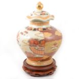 A large Oriental covered storage jar.