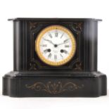 A Victorian slate mantel clock.