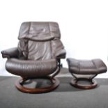 Ekornes 'Stressless' Consul recliner easy chair and matching footstool.